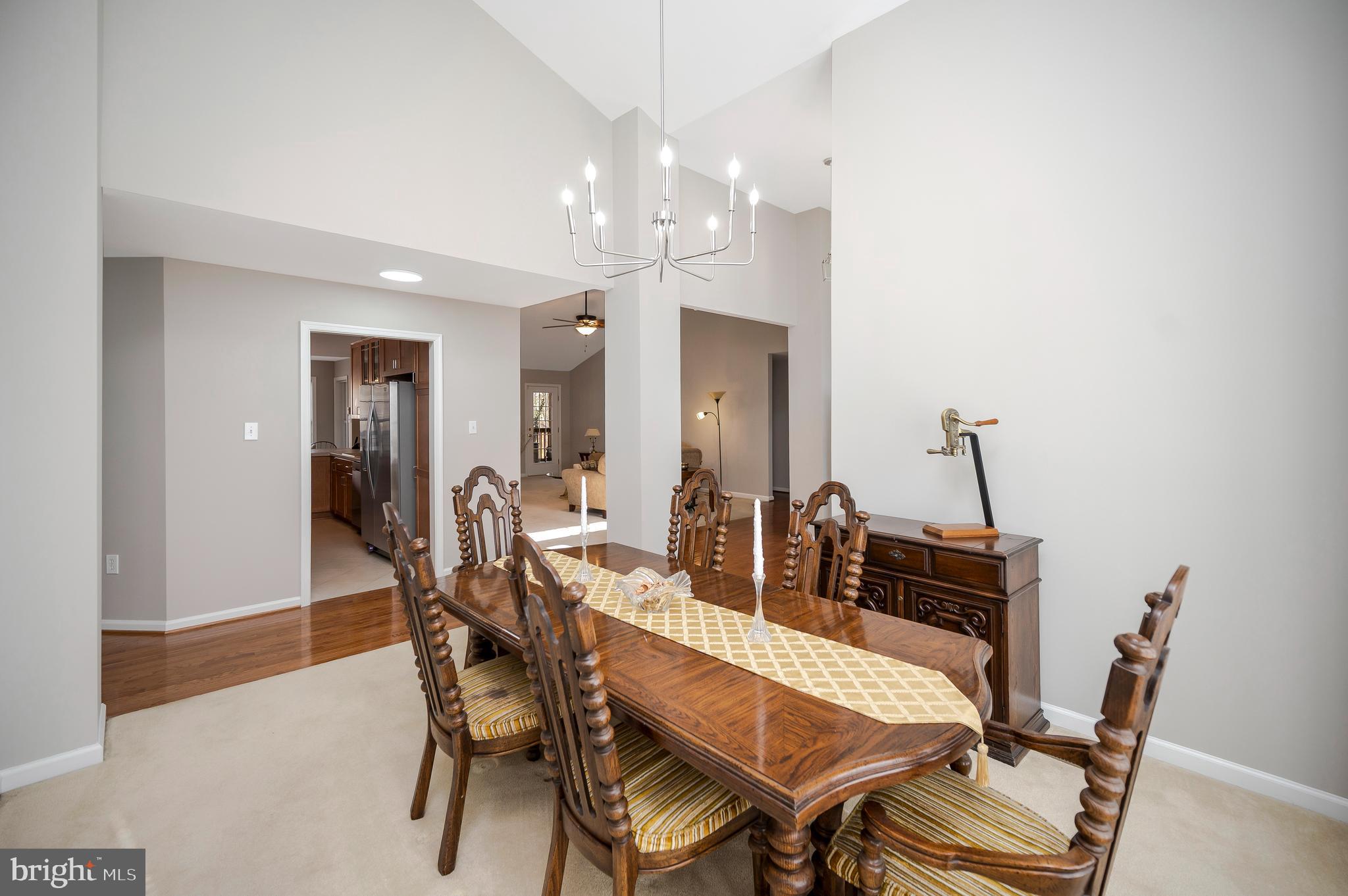 550 Harrison Circle Locust Grove, VA 22508 - Photo 6 of 39 Where meals shine under chandelier light.