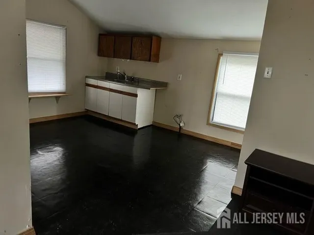 a view of a street with cars