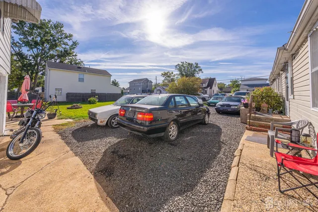 a car parked in front of a house