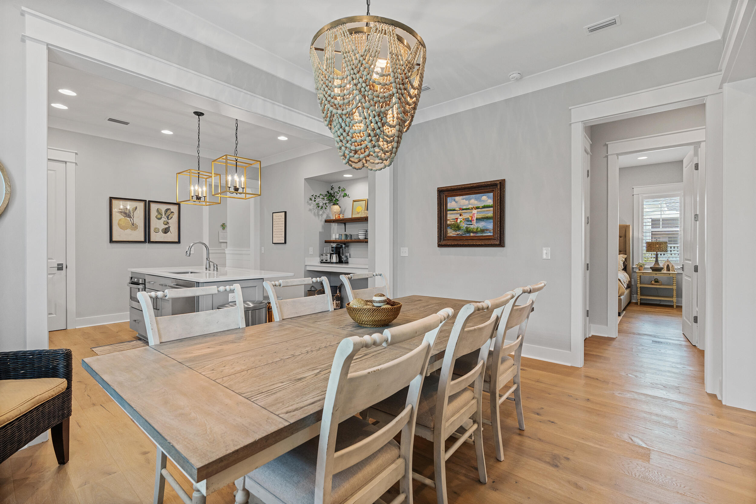 170 Sidecamp Road, Unit LOT 85 Watersound, FL 32461 - Photo 11 of 54 a view of a dining room with furniture and wooden floor