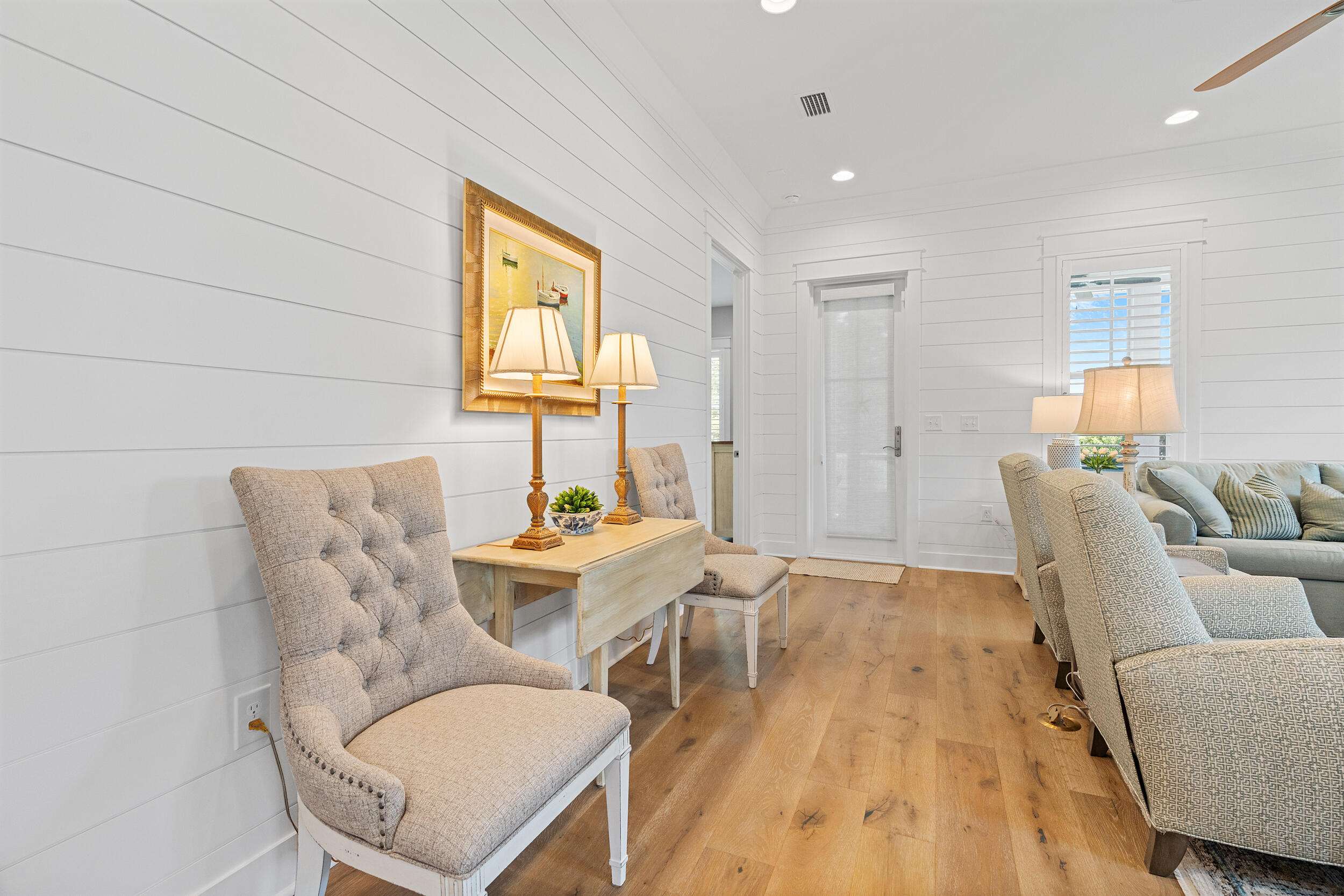 170 Sidecamp Road, Unit LOT 85 Watersound, FL 32461 - Photo 17 of 54 a living room with furniture and a wooden floor
