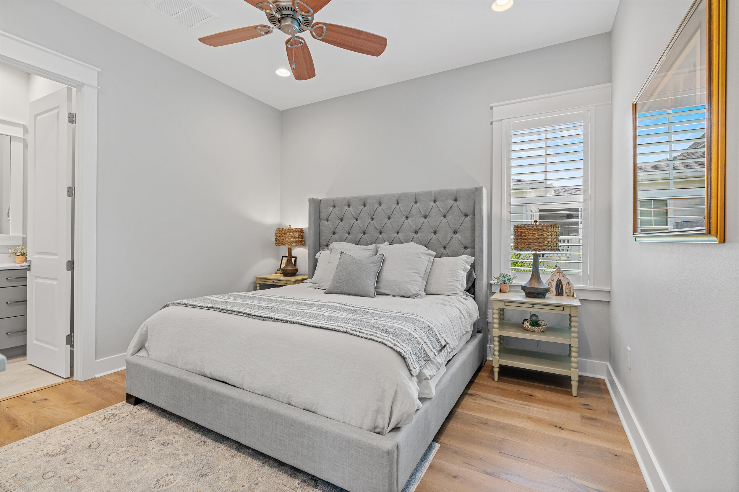 170 Sidecamp Road, Unit LOT 85 Watersound, FL 32461 - Photo 21 of 54 a bedroom with a bed and window