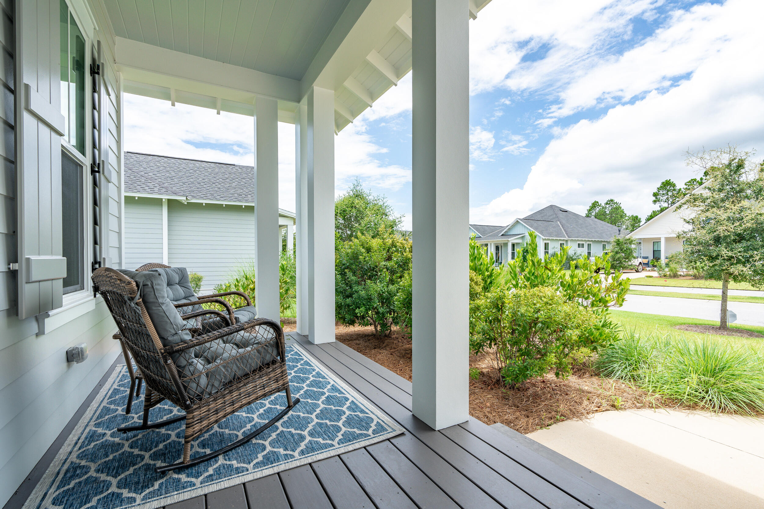 170 Sidecamp Road, Unit LOT 85 Watersound, FL 32461 - Photo 3 of 54 a backyard of a house with outdoor seating