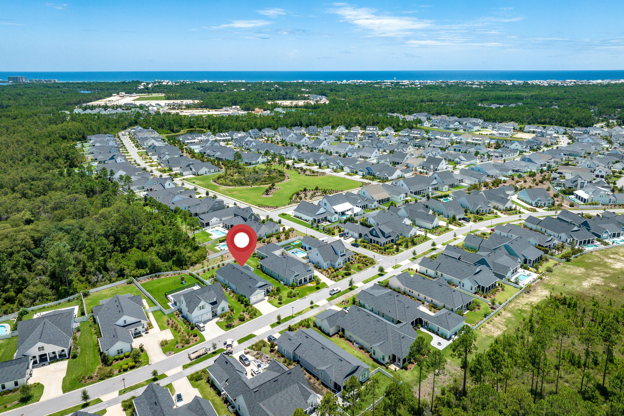 170 Sidecamp Road, Unit LOT 85 Watersound, FL 32461 - Photo 48 of 54 an aerial view of residential building and lake