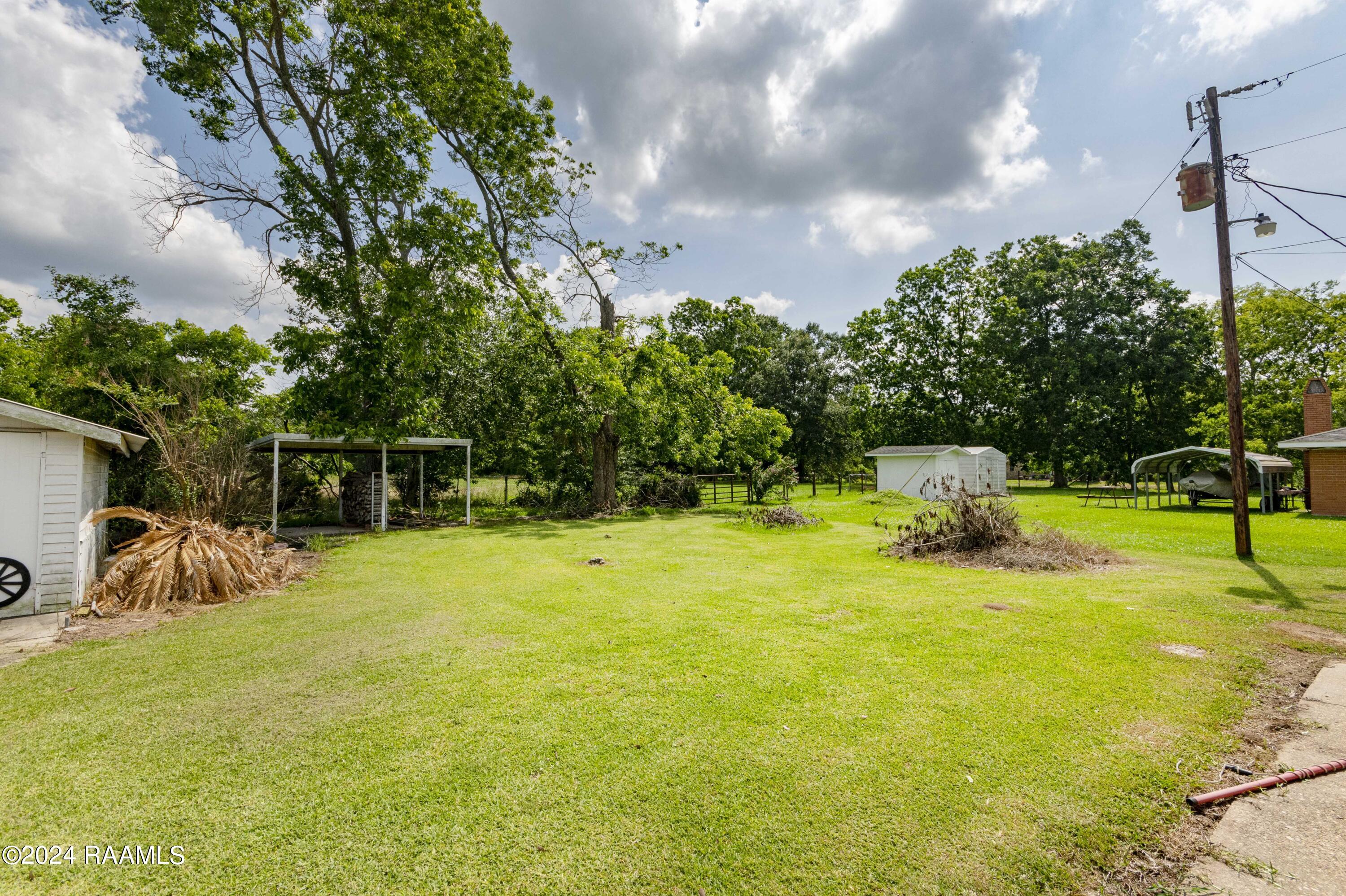 838 Country Ridge Road Opelousas, LA 70570 - Photo 29 of 39 Back Yard 1