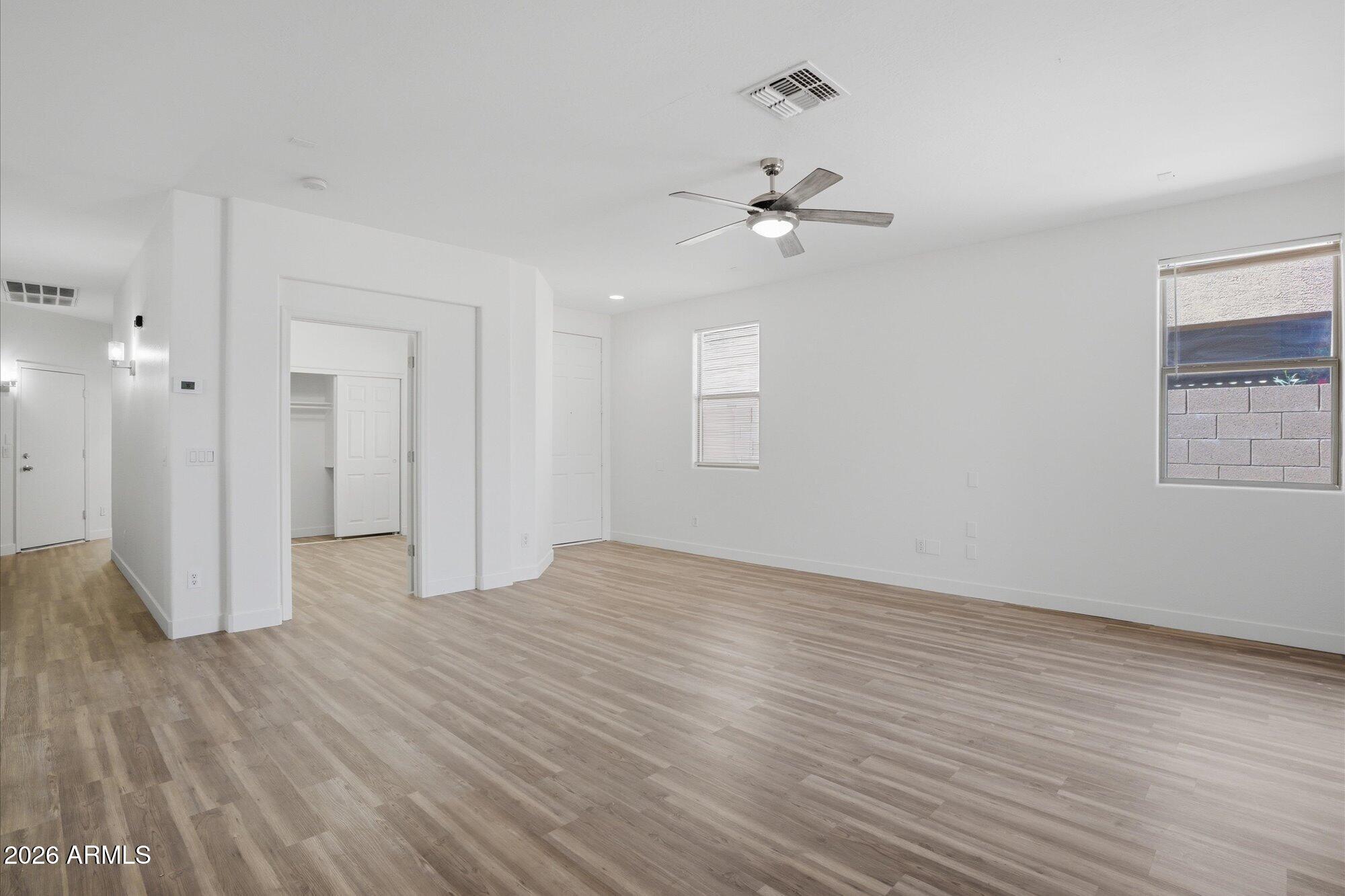 8838 West Payson Road Tolleson, AZ 85353 - Photo 6 of 22 a view of an empty room with a window