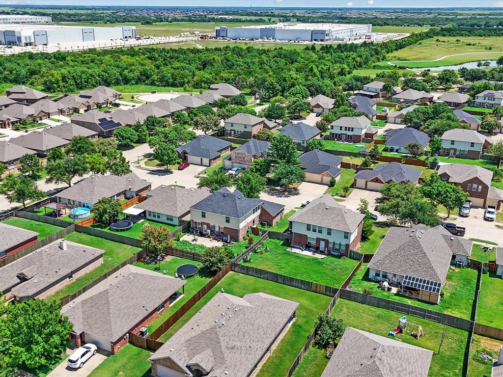 2009 Cooper Ridge Lane Heartland, TX 75126 - Photo 30 of 40 an aerial view of a house with a garden