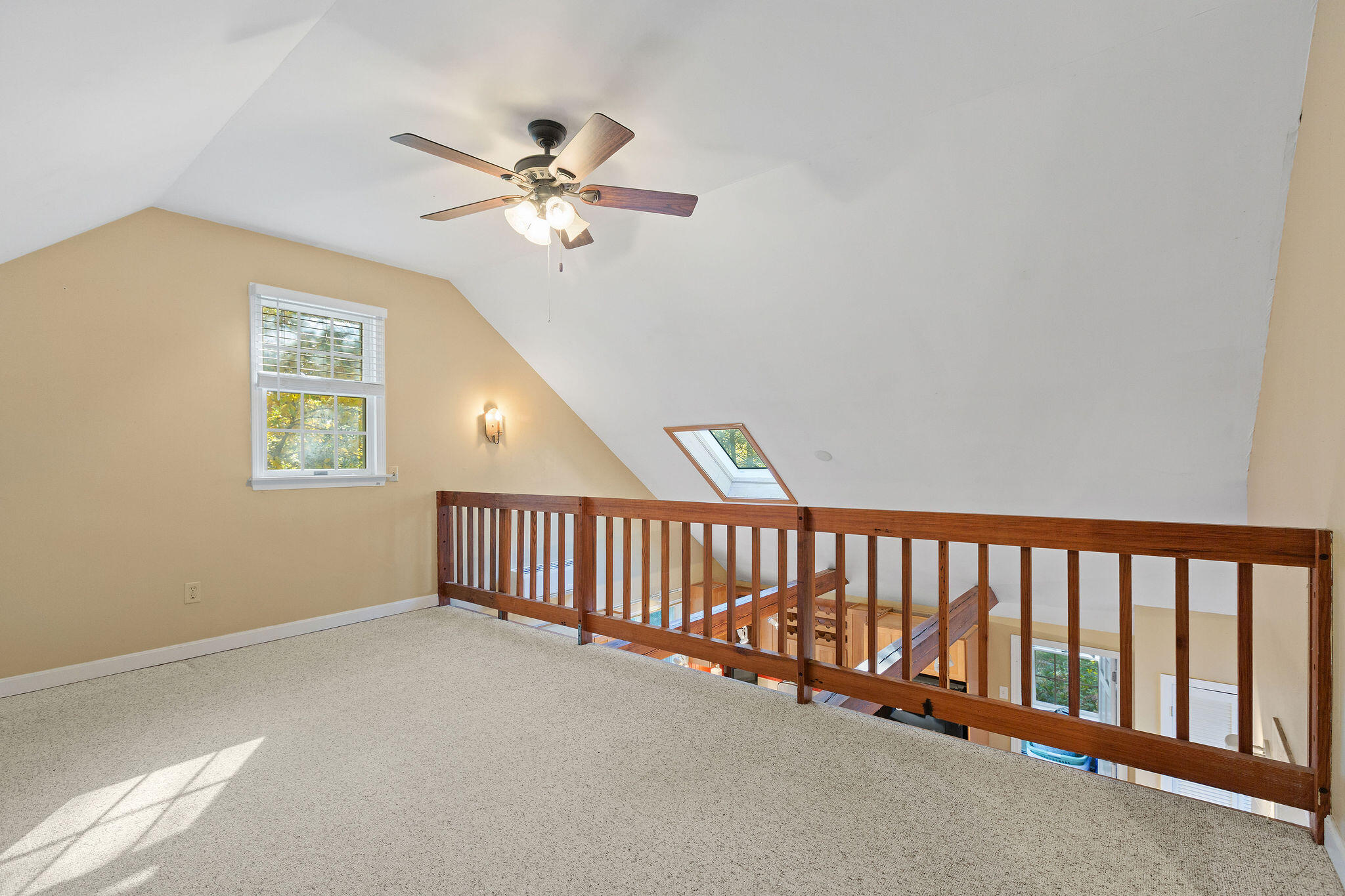 274 Commons Way Brewster, MA 02631 - Photo 17 of 32 a view of a livingroom with a ceiling fan