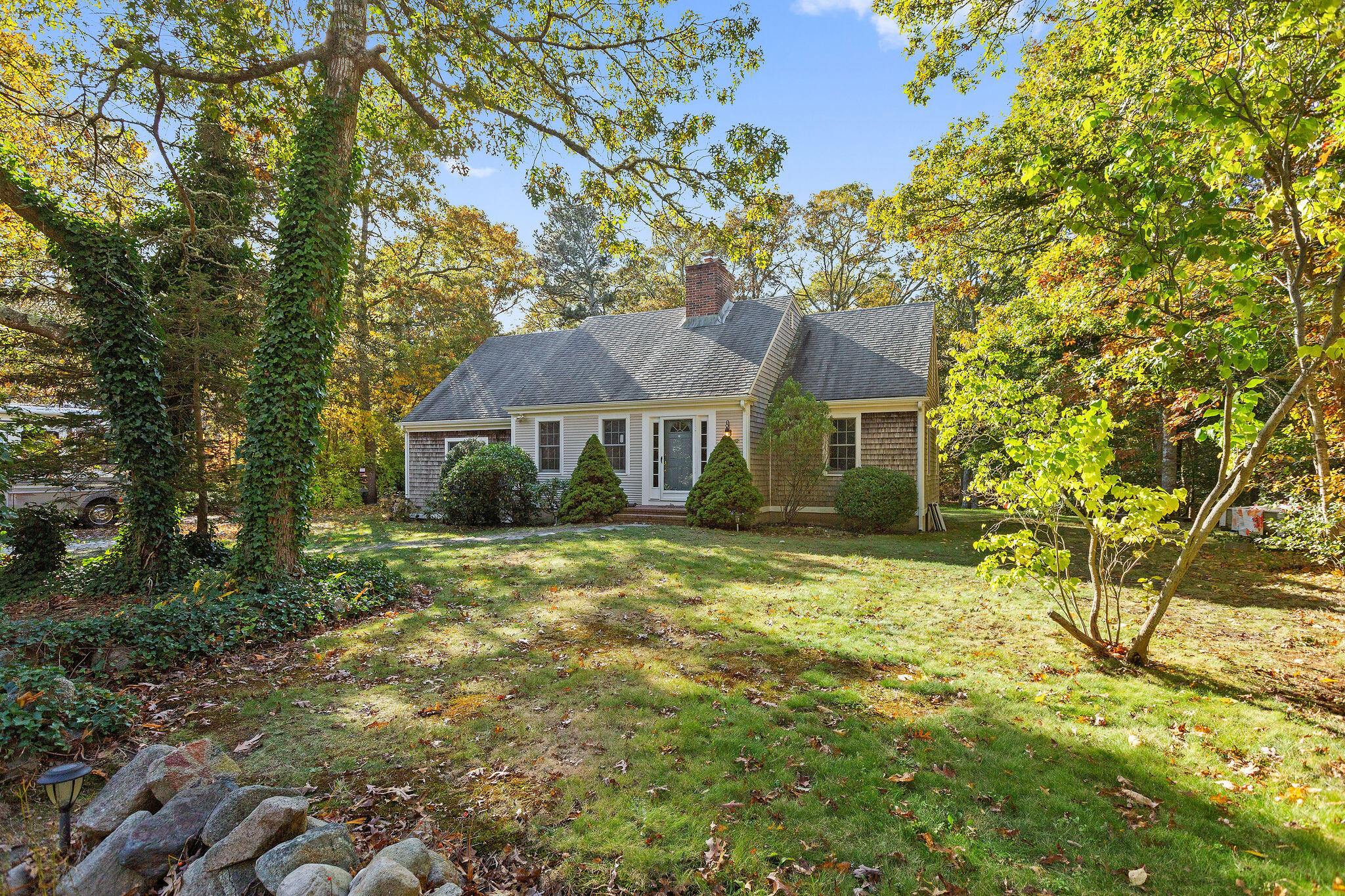 274 Commons Way Brewster, MA 02631 - Photo 19 of 32 a view of house with outdoor space