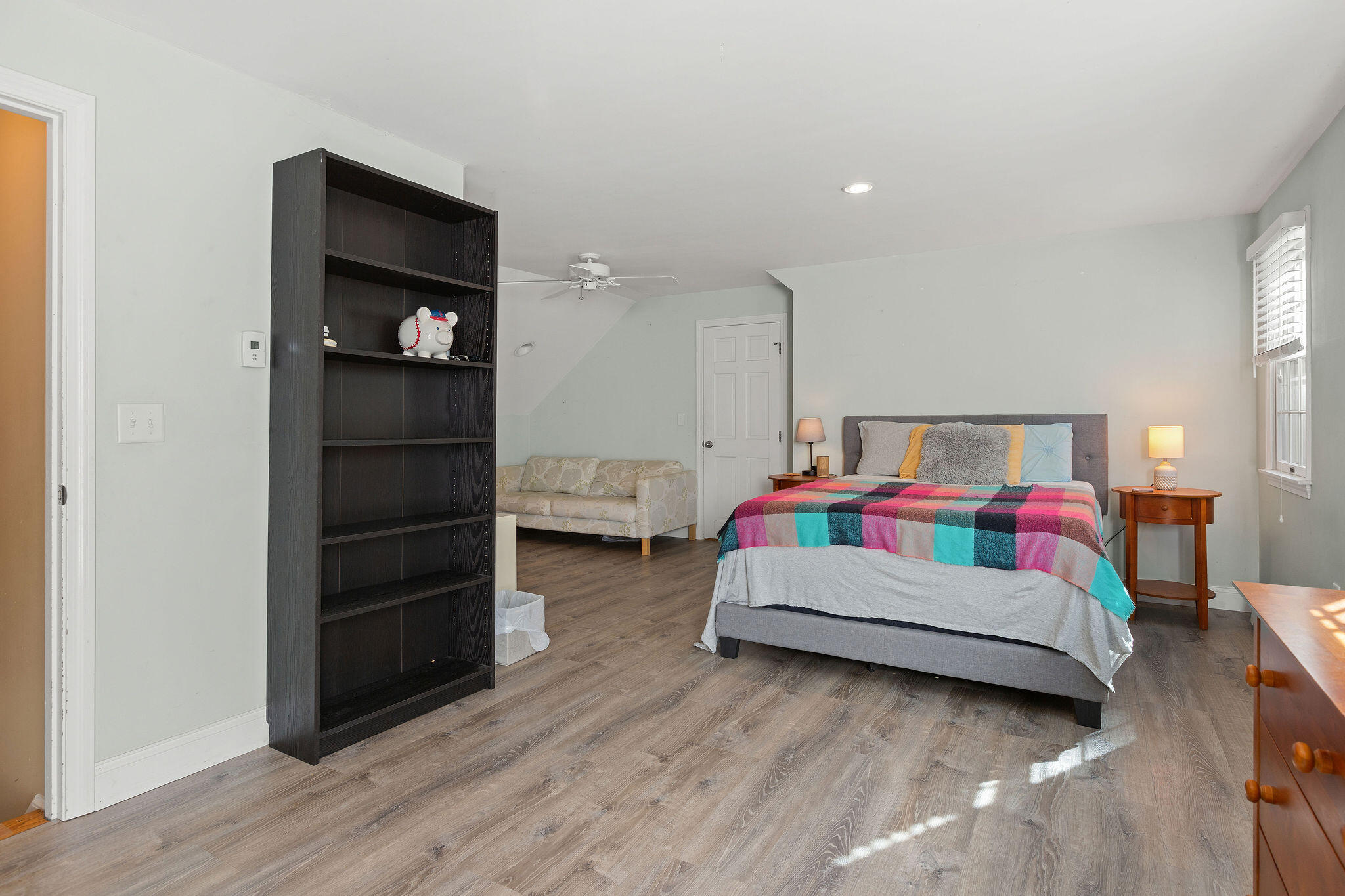 274 Commons Way Brewster, MA 02631 - Photo 27 of 32 a bedroom with a bed and a cabinets