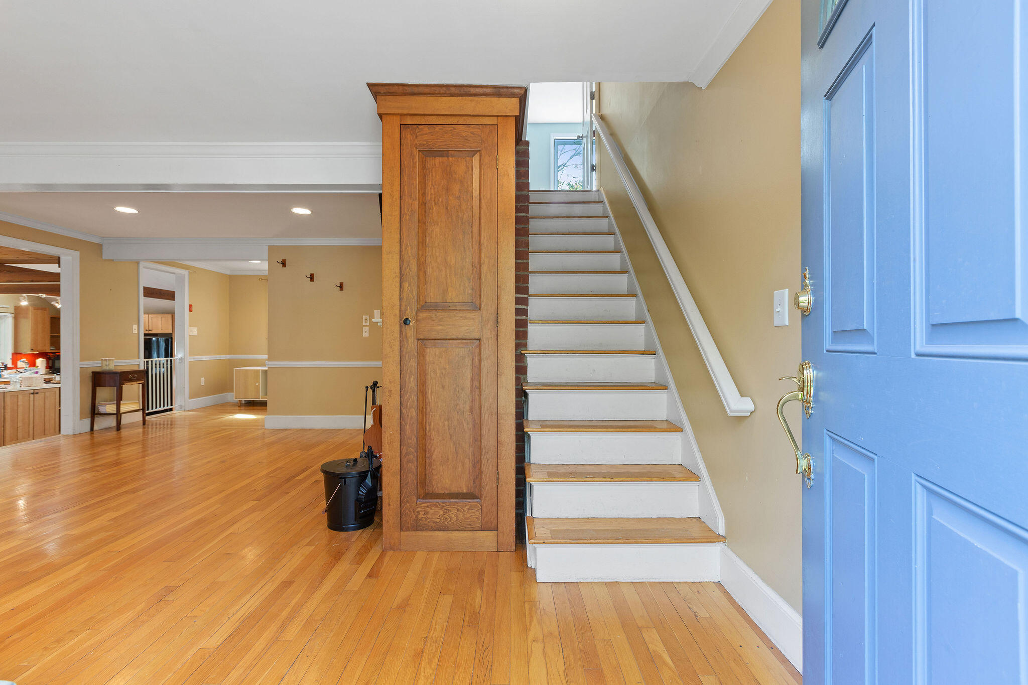 274 Commons Way Brewster, MA 02631 - Photo 10 of 32 a view of a living room with wooden floor and stairs