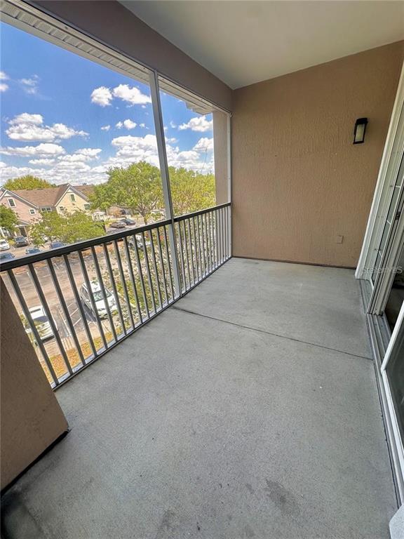3280 Soho Street, Unit 307 Orlando, FL 32835 - Photo 7 of 34 a view of balcony