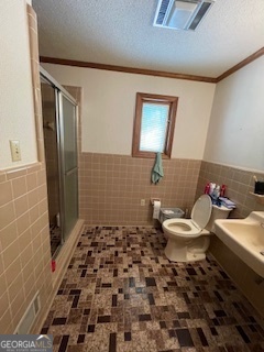 1478 Mineral Springs Road Elberton, GA 30635 - Photo 19 of 30 a bathroom with a sink a toilet and shower
