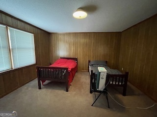 1478 Mineral Springs Road Elberton, GA 30635 - Photo 20 of 30 a bedroom with a bed and a chandelier