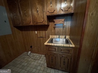 1478 Mineral Springs Road Elberton, GA 30635 - Photo 21 of 30 a kitchen with granite countertop a sink stove and cabinets