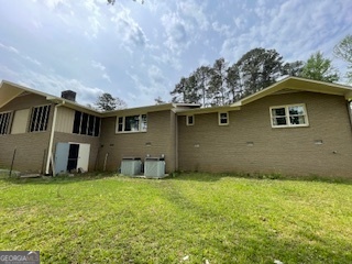 1478 Mineral Springs Road Elberton, GA 30635 - Photo 29 of 30 a front view of house with yard and trees in the background
