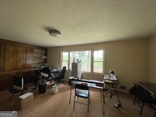 1478 Mineral Springs Road Elberton, GA 30635 - Photo 3 of 30 a workspace with furniture hardwood and a window
