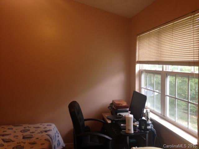 8214 Rudolph Road, Unit 8214 Charlotte, NC 28216 - Photo 3 of 19 a view of a workspace with a window