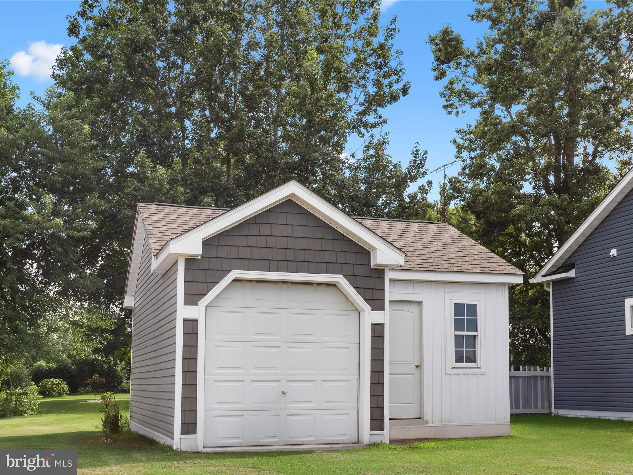 18362 Pin Oak Street Ellendale, DE 19941 - Photo 40 of 43 Detached Garage Secure Storage