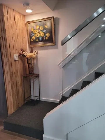 a bedroom with bed and furniture