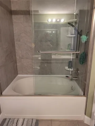 a close view of a bathtub in bathroom
