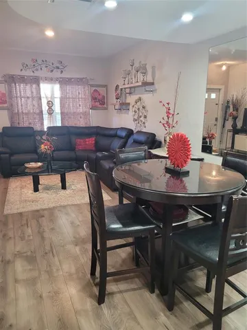a view of a dining room with furniture