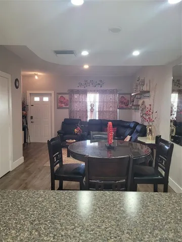 a view of a dining room with furniture