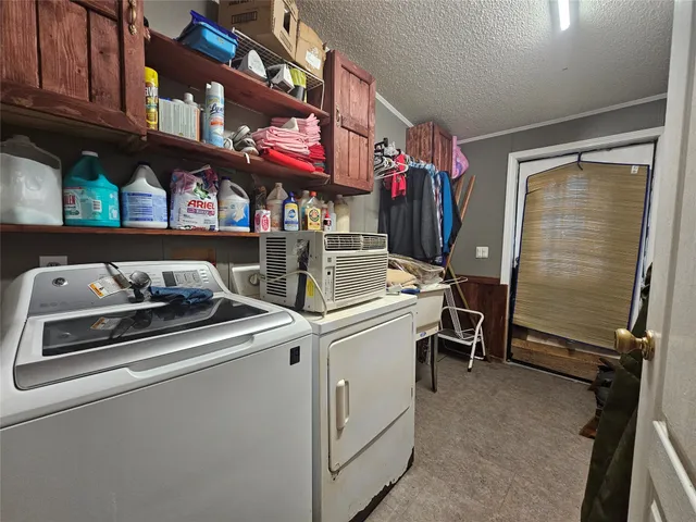 a kitchen with a stove and a refrigerator
