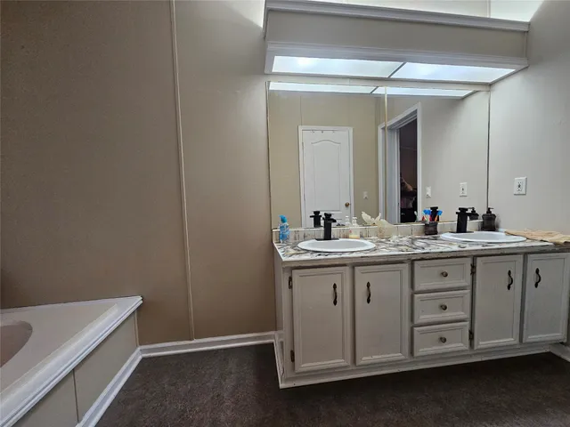 a view of a bathroom with a sink and toilet