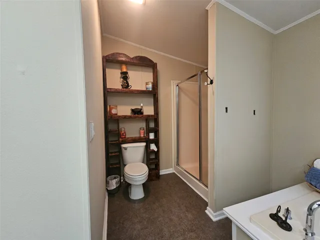 a bathroom with a tub and shower