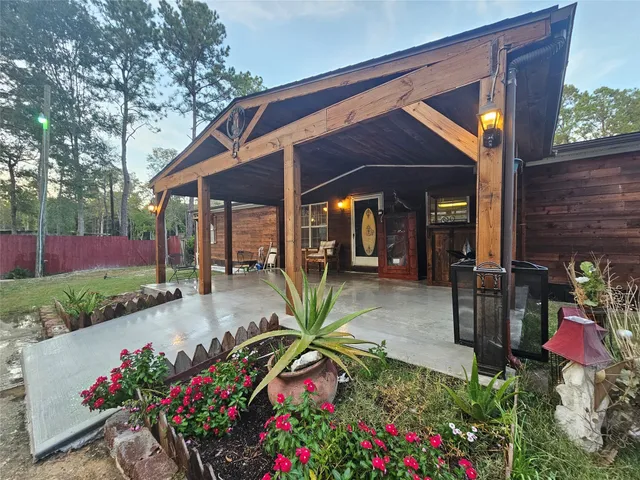 a view of backyard with green space