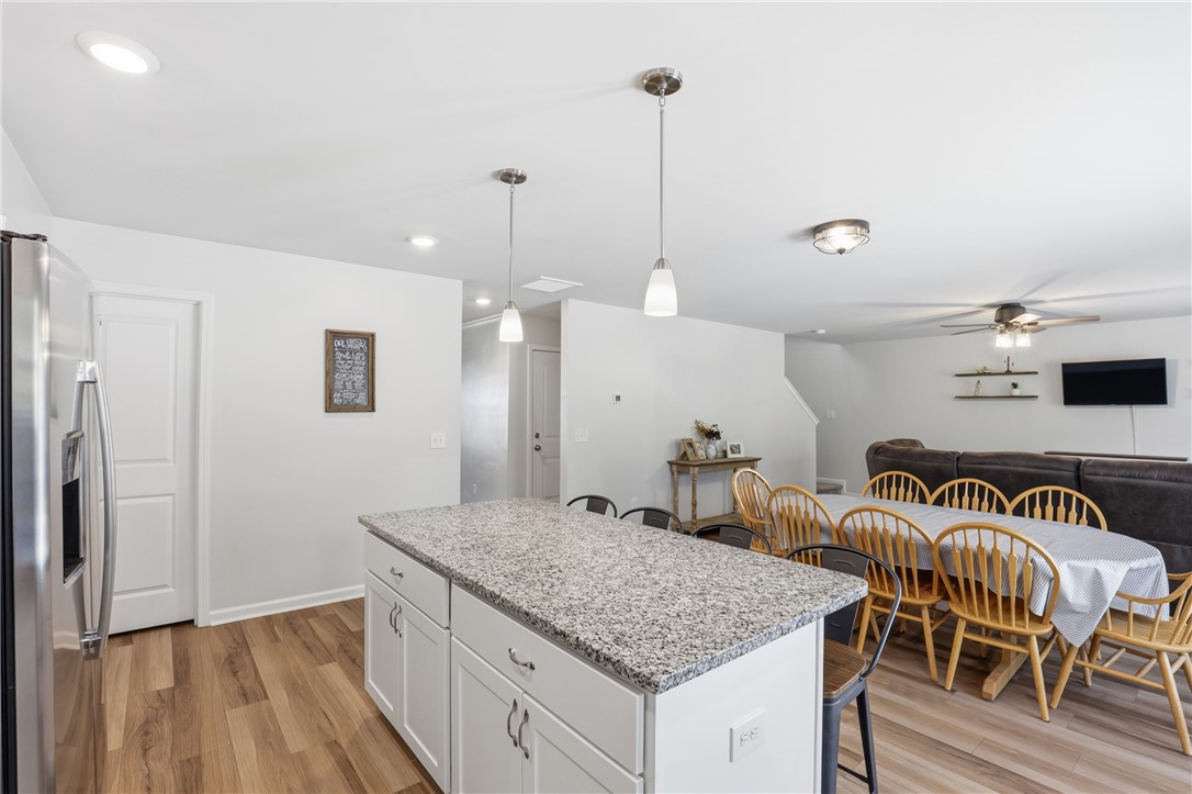 36 Chalet Court Anderson, SC 29621 - Photo 10 of 30 This open concept living area boasts a spacious kitchen island and inviting dining space.