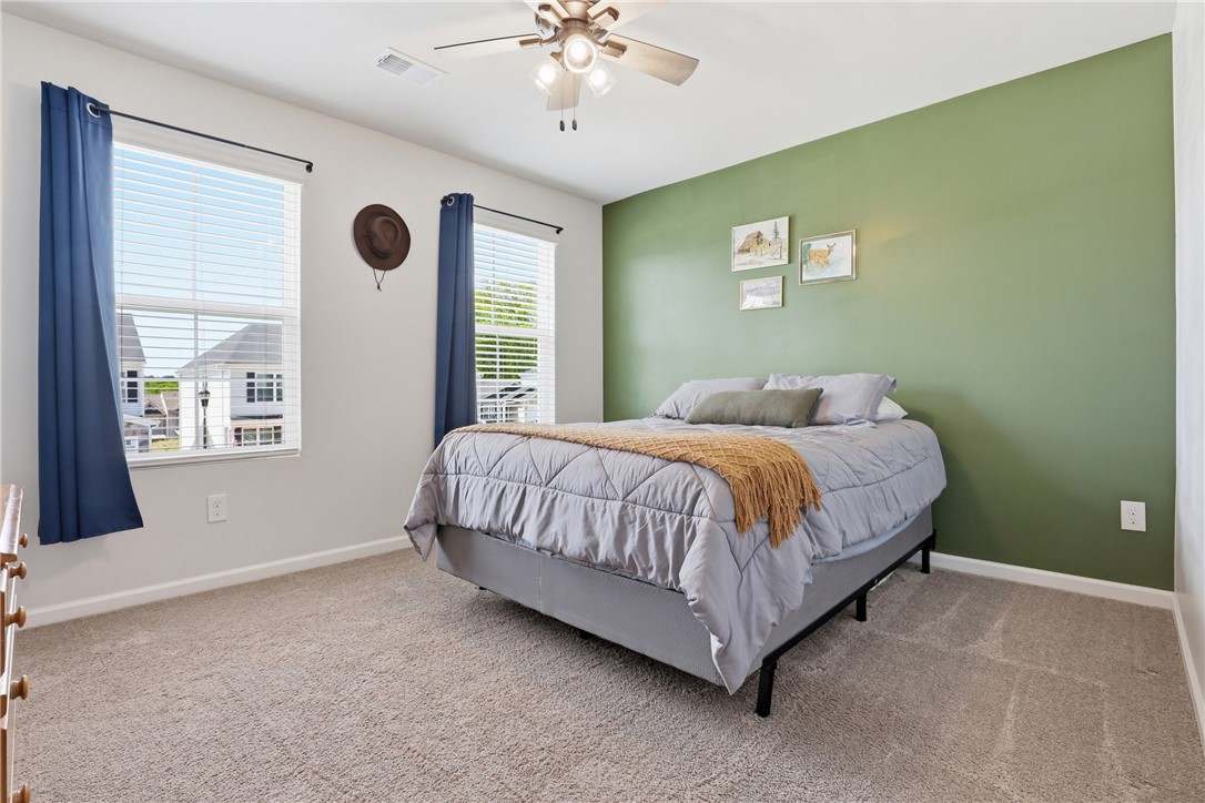 36 Chalet Court Anderson, SC 29621 - Photo 18 of 30 This cozy bedroom features plush carpeting and abundant natural light.
