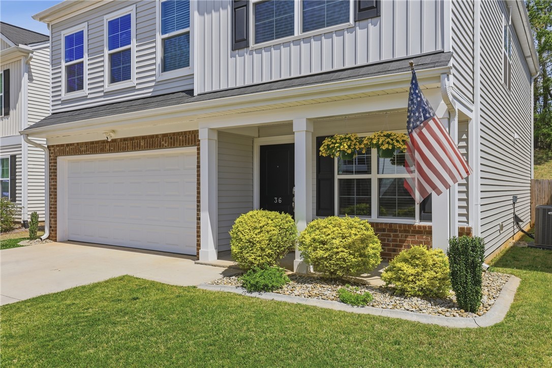 36 Chalet Court Anderson, SC 29621 - Photo 2 of 30 This charming home offers a welcoming front exterior with a classic design and lush landscaping.