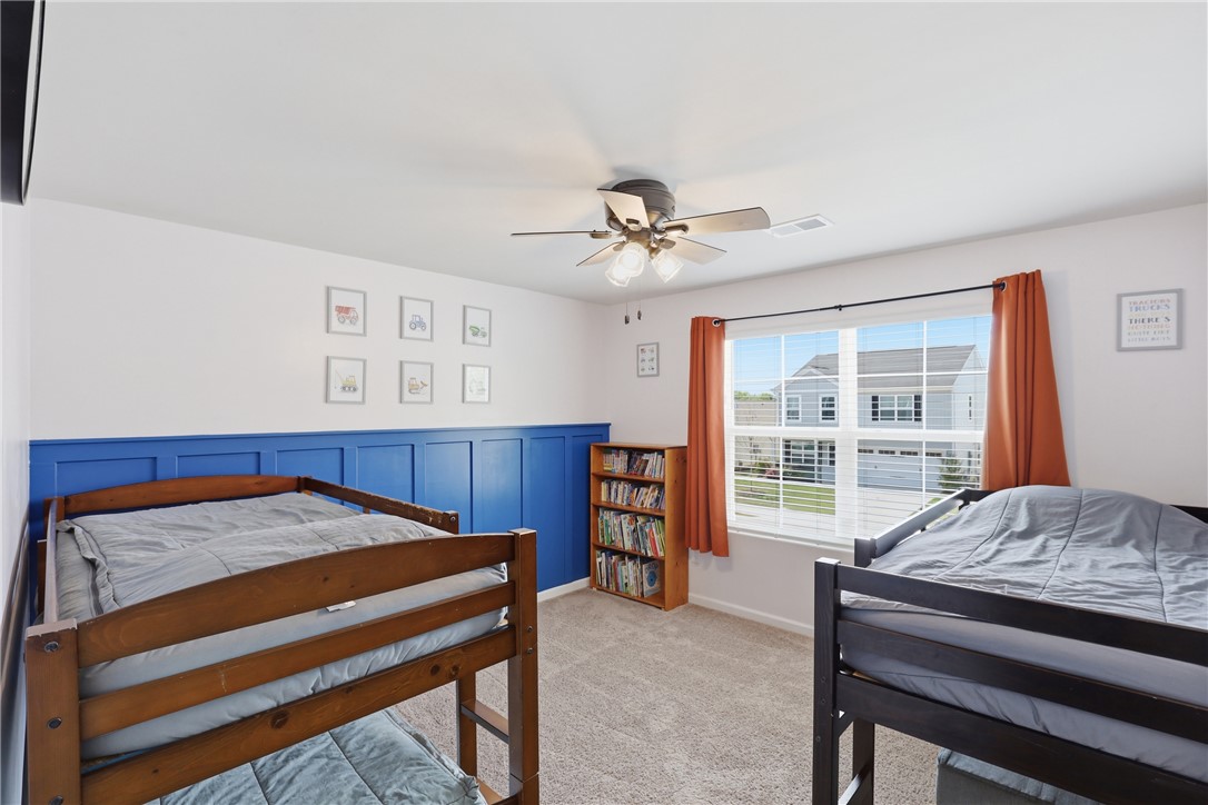 36 Chalet Court Anderson, SC 29621 - Photo 21 of 30 This inviting bedroom offers comfort and a bright atmosphere, perfect for rest and relaxation.