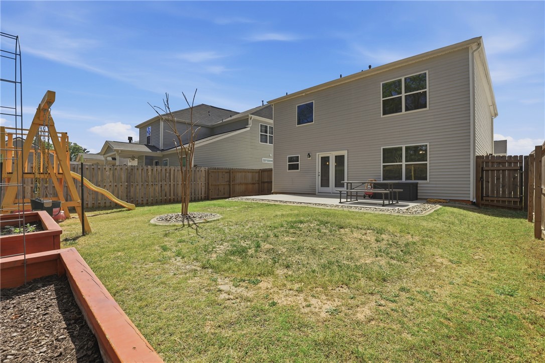 36 Chalet Court Anderson, SC 29621 - Photo 25 of 30 This spacious private yard features a patio, perfect for outdoor entertaining and relaxation.