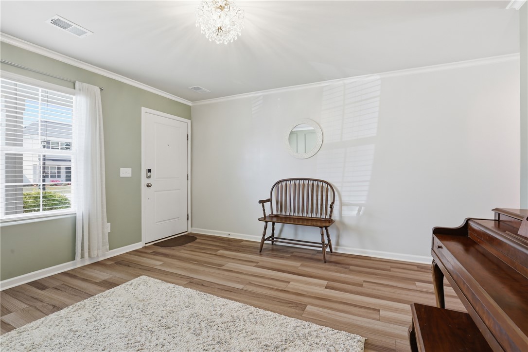 36 Chalet Court Anderson, SC 29621 - Photo 4 of 30 This inviting entryway features warm flooring and ample natural light, creating a welcoming first impression.