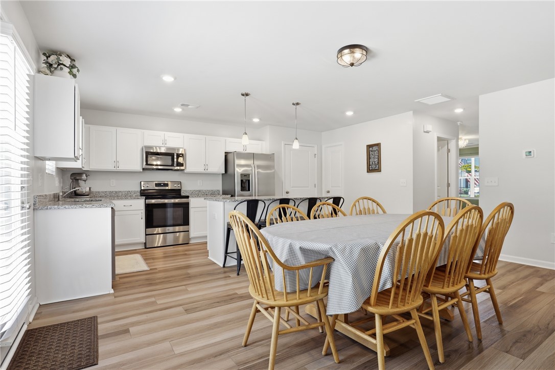 36 Chalet Court Anderson, SC 29621 - Photo 7 of 30 This spacious kitchen and dining area offers comfortable living and entertaining.