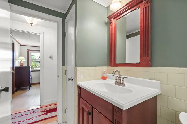 a view of deck with a large trees