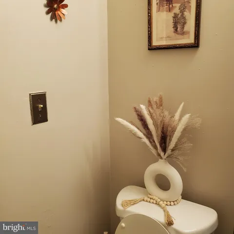 a bathroom with a toilet and a sink