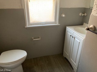 1508 Genesee Road South Euclid, OH 44121 - Photo 9 of 12 Bathroom featuring vanity and dark hardwood flooring