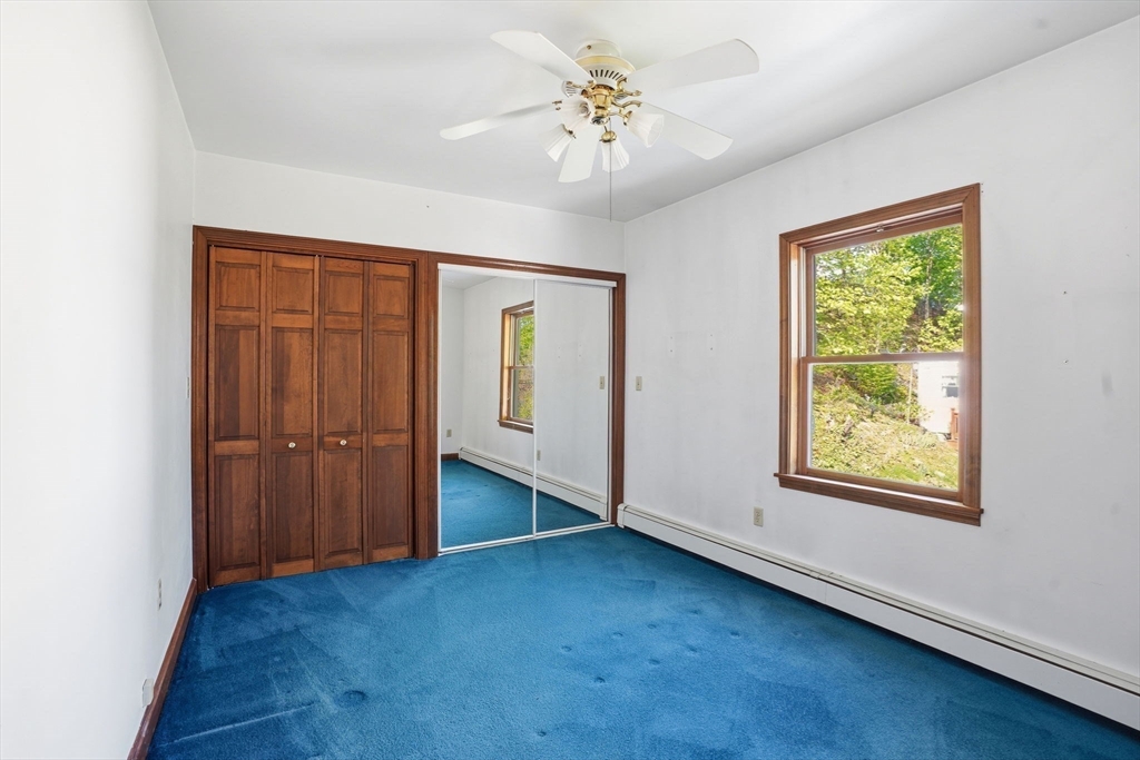 67 Wituwamat Road Weymouth, MA 02191 - Photo 21 of 42 an empty room with windows and closet