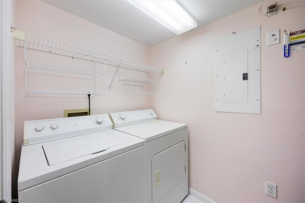 21 Bluebill Avenue, Unit B806 Naples, FL 34108 - Photo 21 of 22 a utility room with dryer and washer