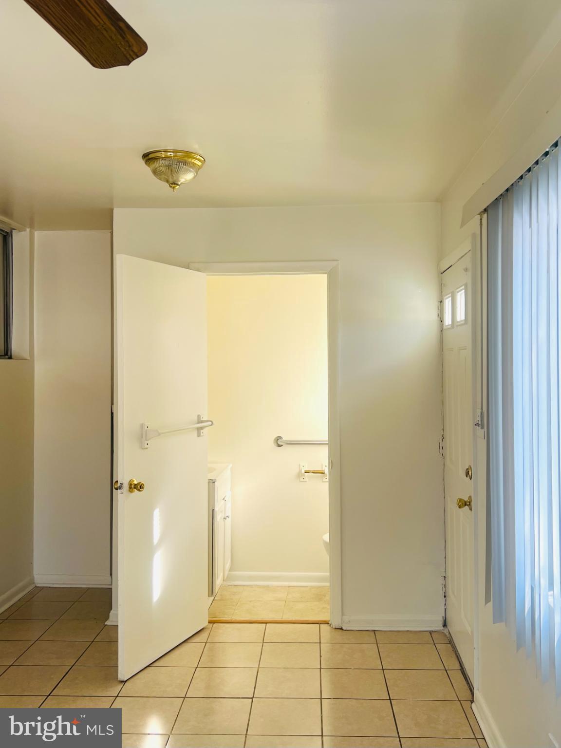 4901 Fitch Place Northeast Washington, DC 20019 - Photo 12 of 47 a view of a bathroom with a shower