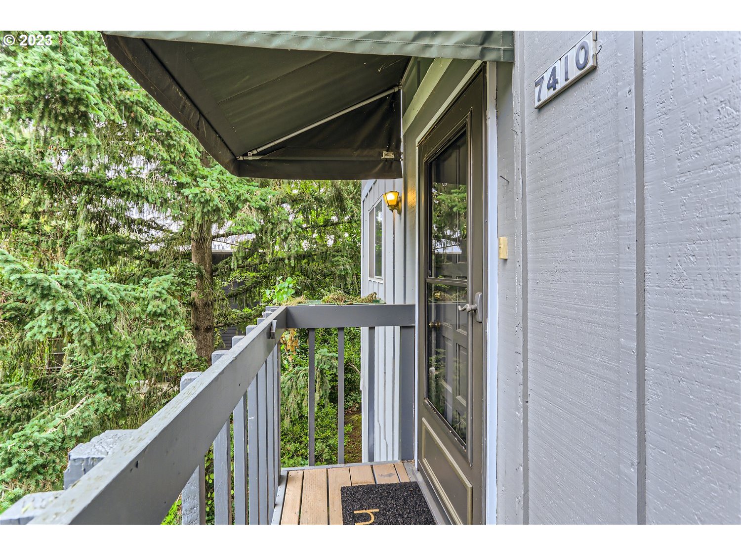 7410 South Virginia Avenue Portland, OR 97219 - Photo 2 of 27 a view of balcony with wooden floor