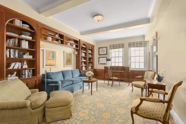 a bathroom with a sink toilet a mirror and shower