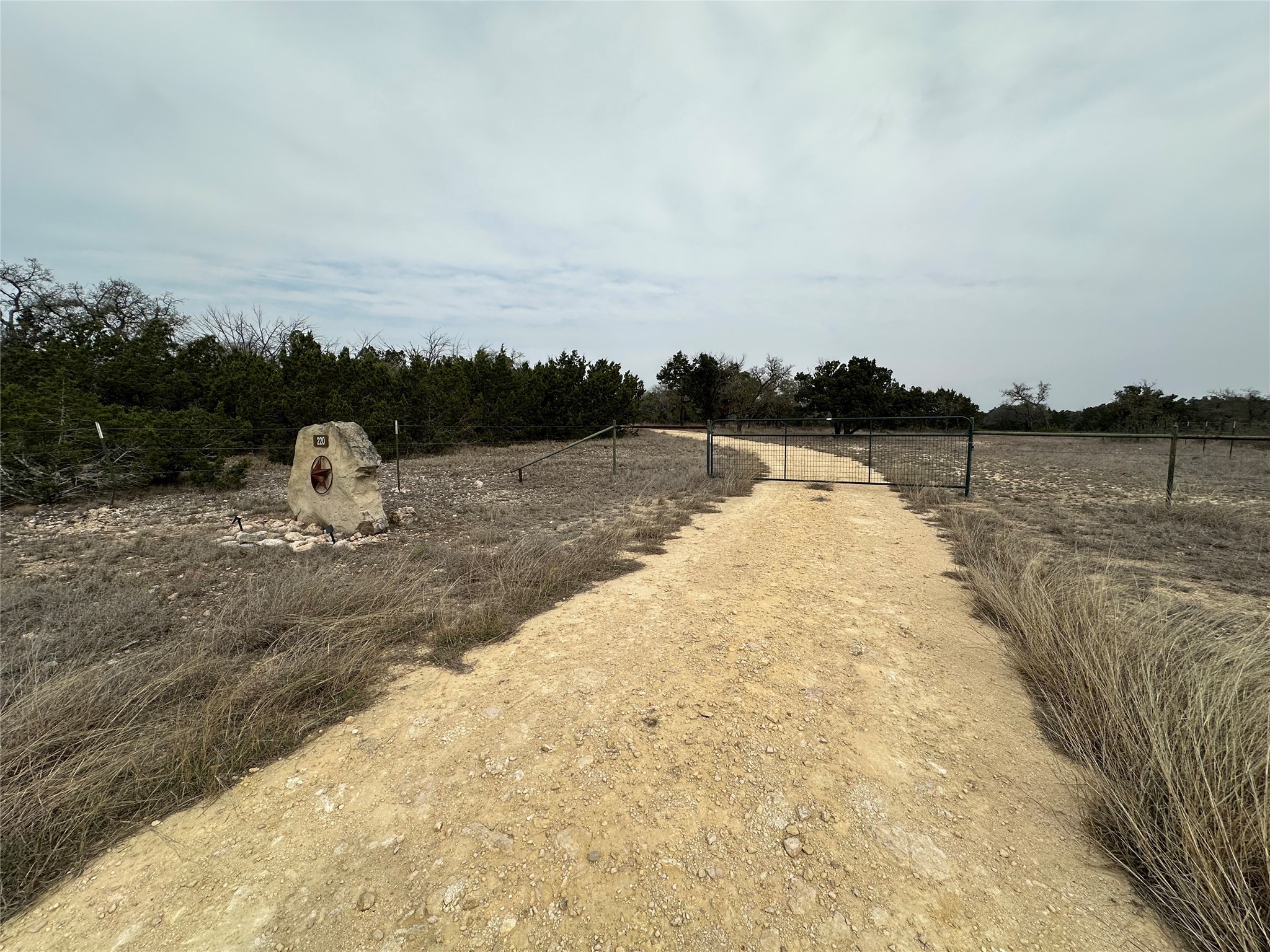 220 Rattlesnake Road Northwest Junction, TX 76849 - Photo 2 of 38 a view of a lake