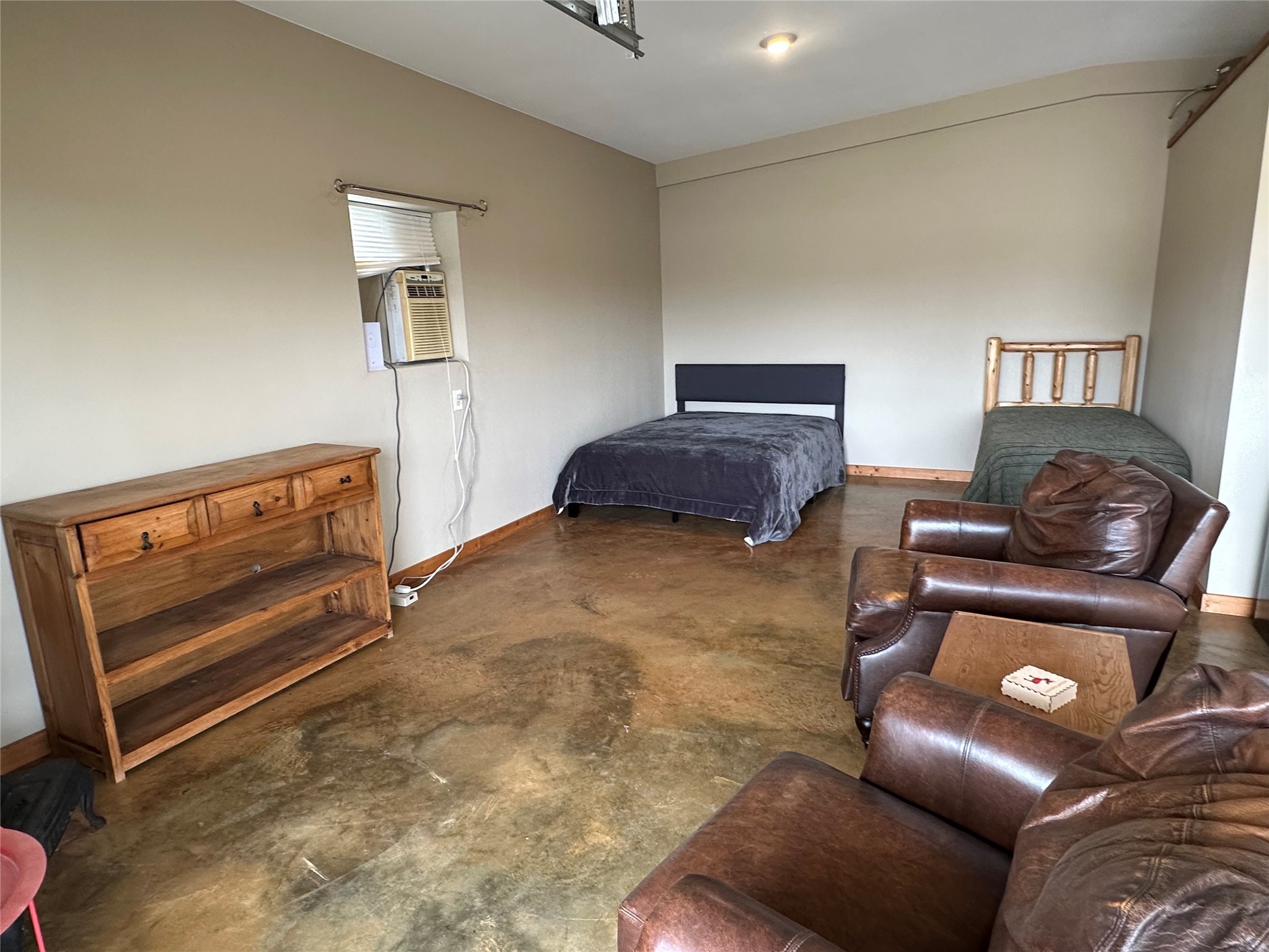 220 Rattlesnake Road Northwest Junction, TX 76849 - Photo 28 of 38 a bedroom with furniture and a dresser