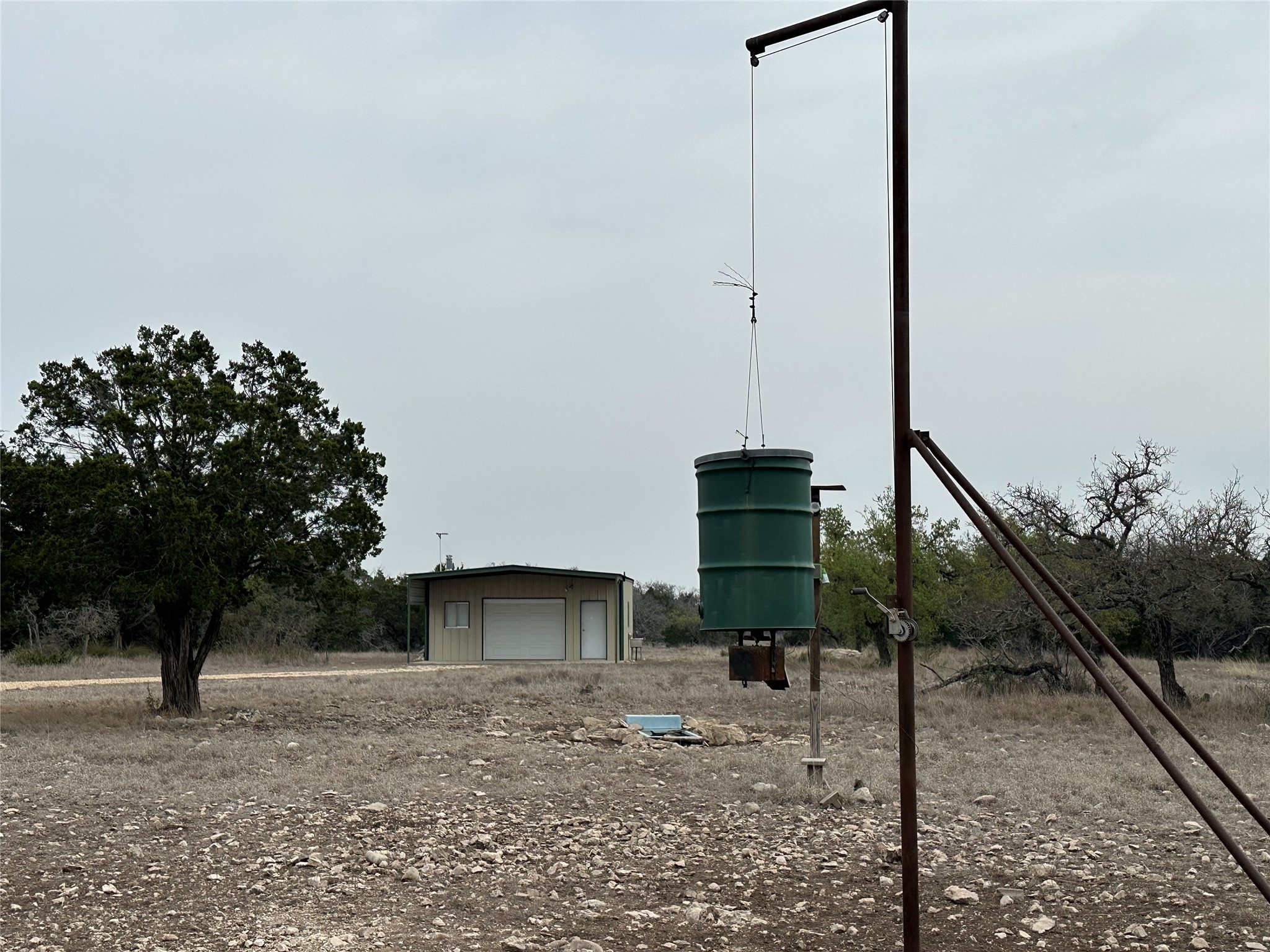 220 Rattlesnake Road Northwest Junction, TX 76849 - Photo 33 of 38 a view of a house with a yard