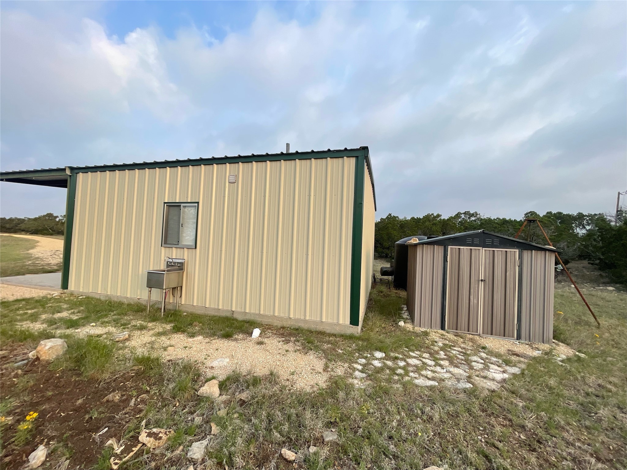 220 Rattlesnake Road Northwest Junction, TX 76849 - Photo 37 of 38 a view of a backyard